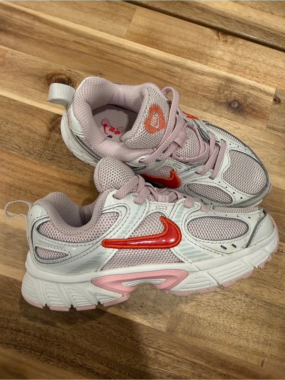 Nike Kids White and Light Pink Retro y2k style Sneakers with Red Swoosh